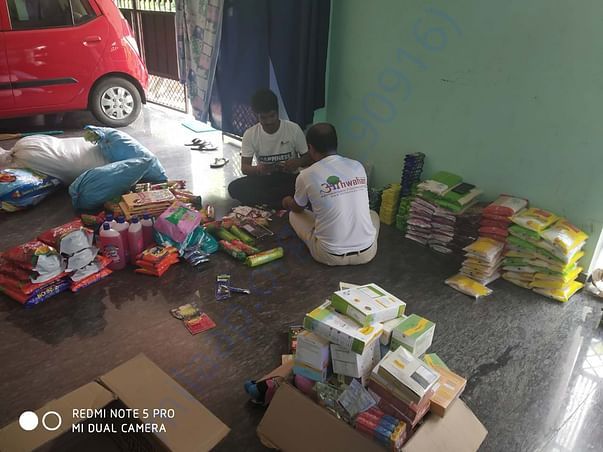 Packaging is going on for dry food for flood affected families