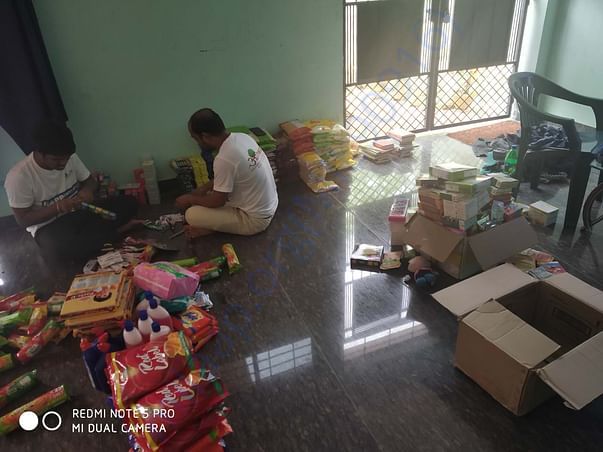 Packaging is going on for dry food for flood affected families