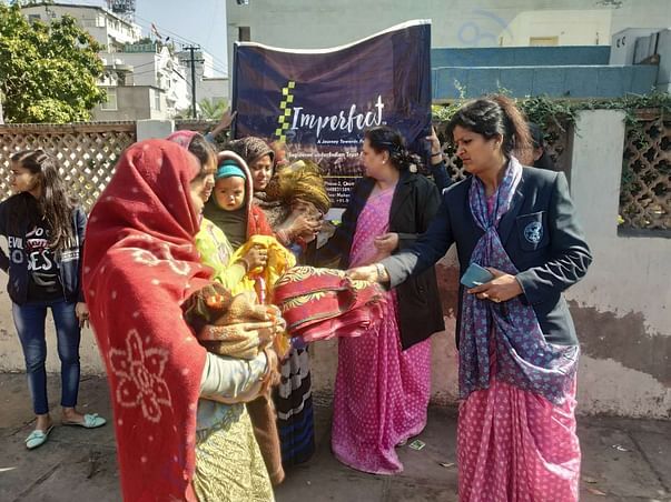Distribution of clothes and blankets to needy in winters.