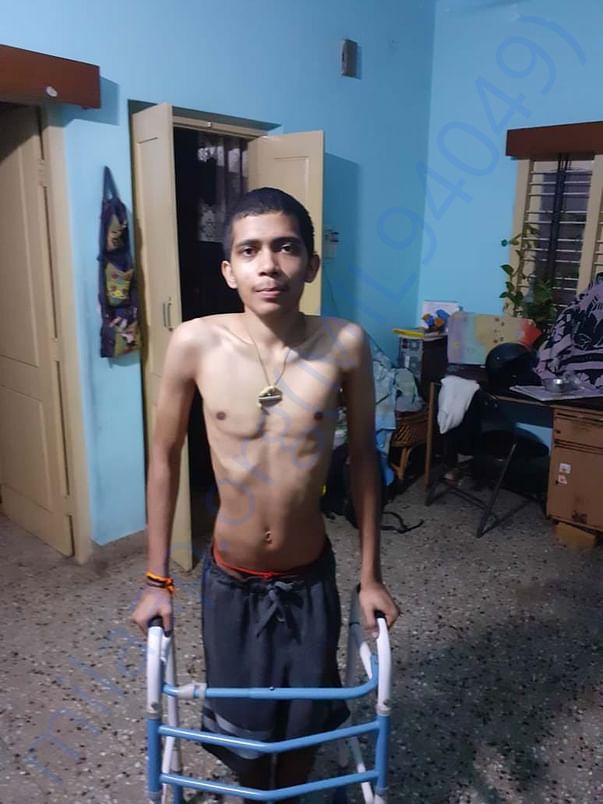 Photo of him unable to stand and walk