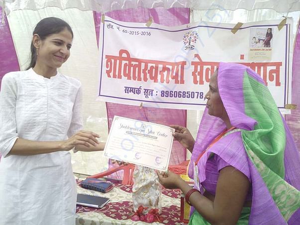 After sewing training, taking certificate