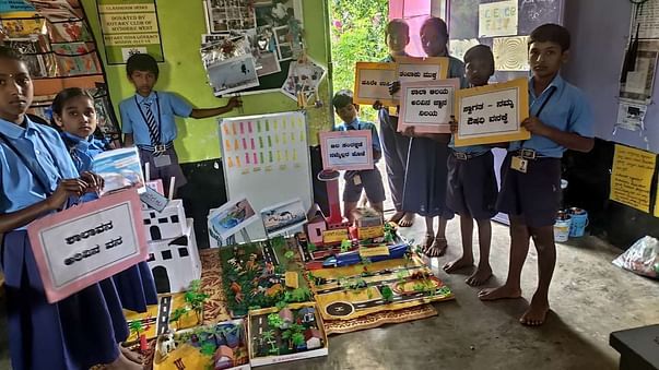 students doing science experiments with aspiring mind