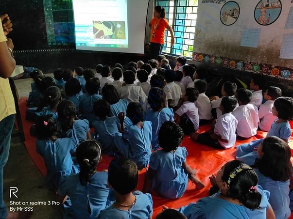 Showing a video clip on Good touch and bad touch to students
