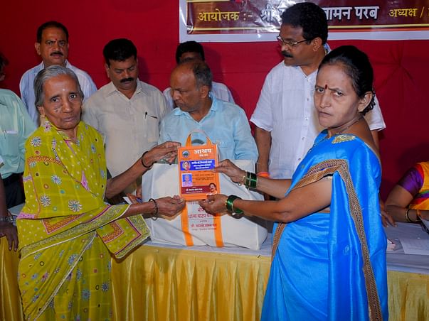 Helping Widow Women by Giving Free Food Grains