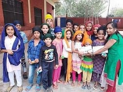 Help These Kids To Wear Woolen Clothes This Winter