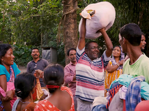Support Saju Talukdar to distribute new and warm clothes
