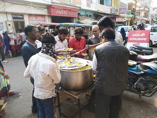 Free food serving -Earlier by Food Stall
