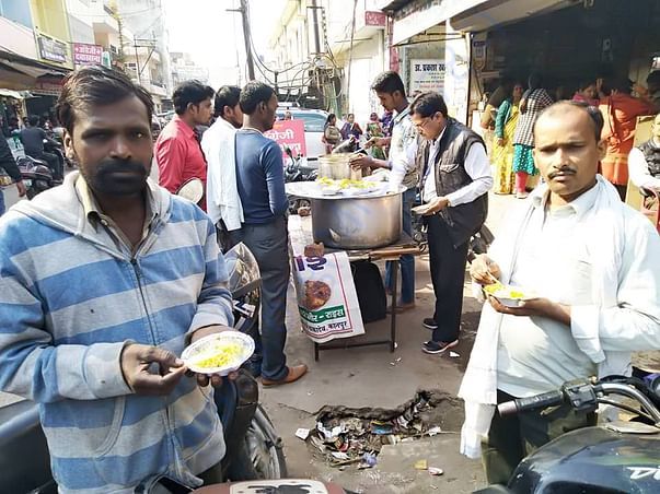 Free food serving -Earlier by Food Stall