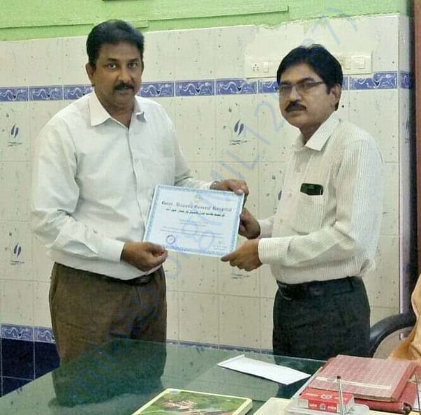 Receving Certificate of Appreciation from Givernment Hospital
