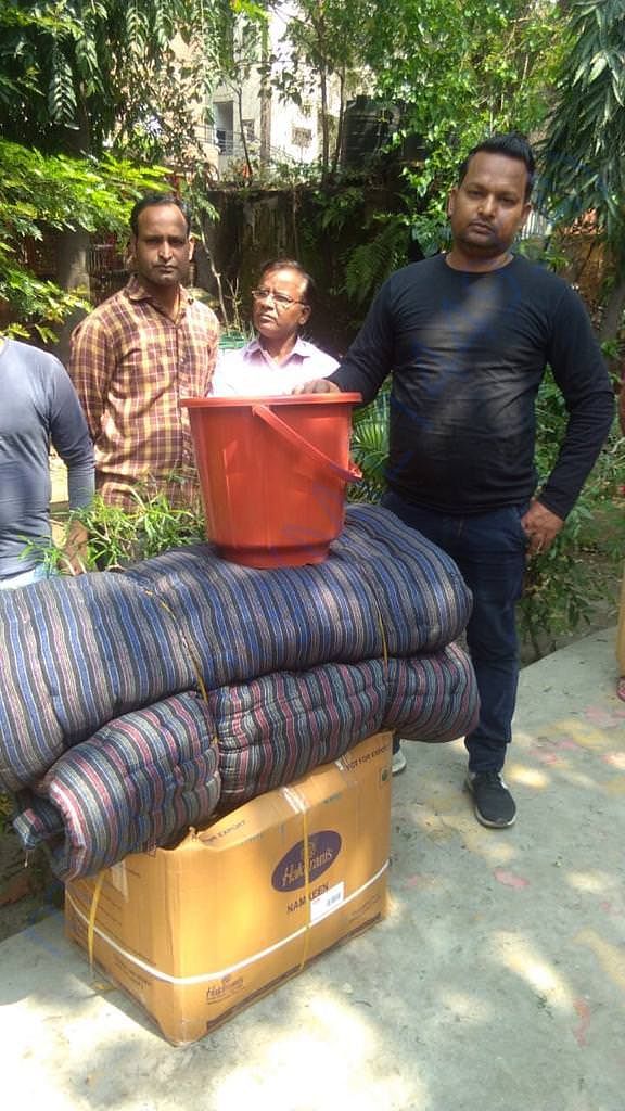 Community members with their rehabilitation kits