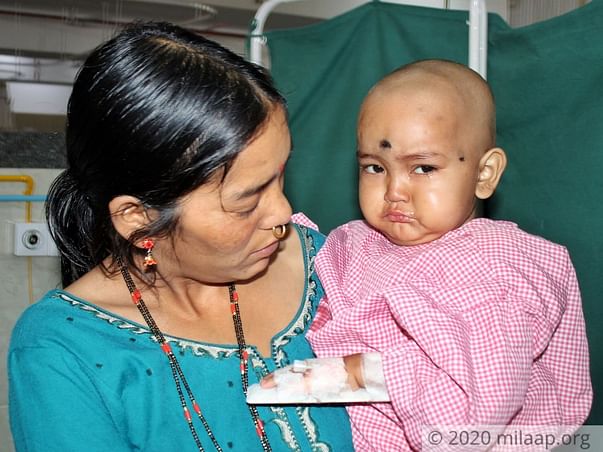 Instead Of Smiling, This 2-Year-Old Cries From The Pain Of Cancer