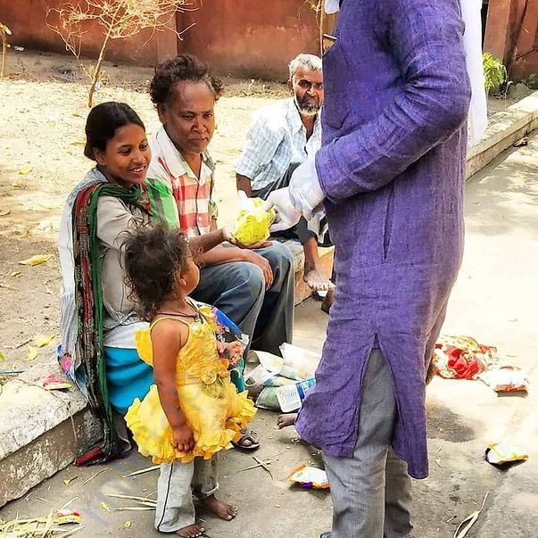 Our volunteers providing food to passersby