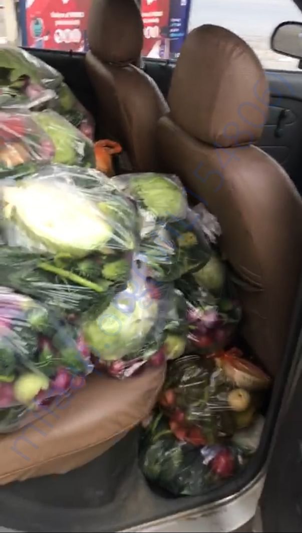 Team taking vegetable packets for distribution