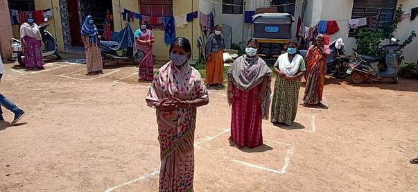 Mysuru - Reciepients maintain social distancing and wear masks