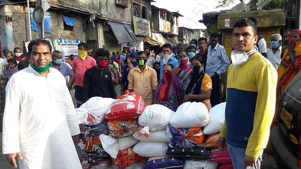 sagar baba distributed in dharavi 100 packet of ration