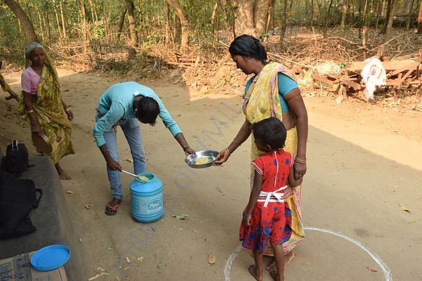 Feeding hungry mother and daughter