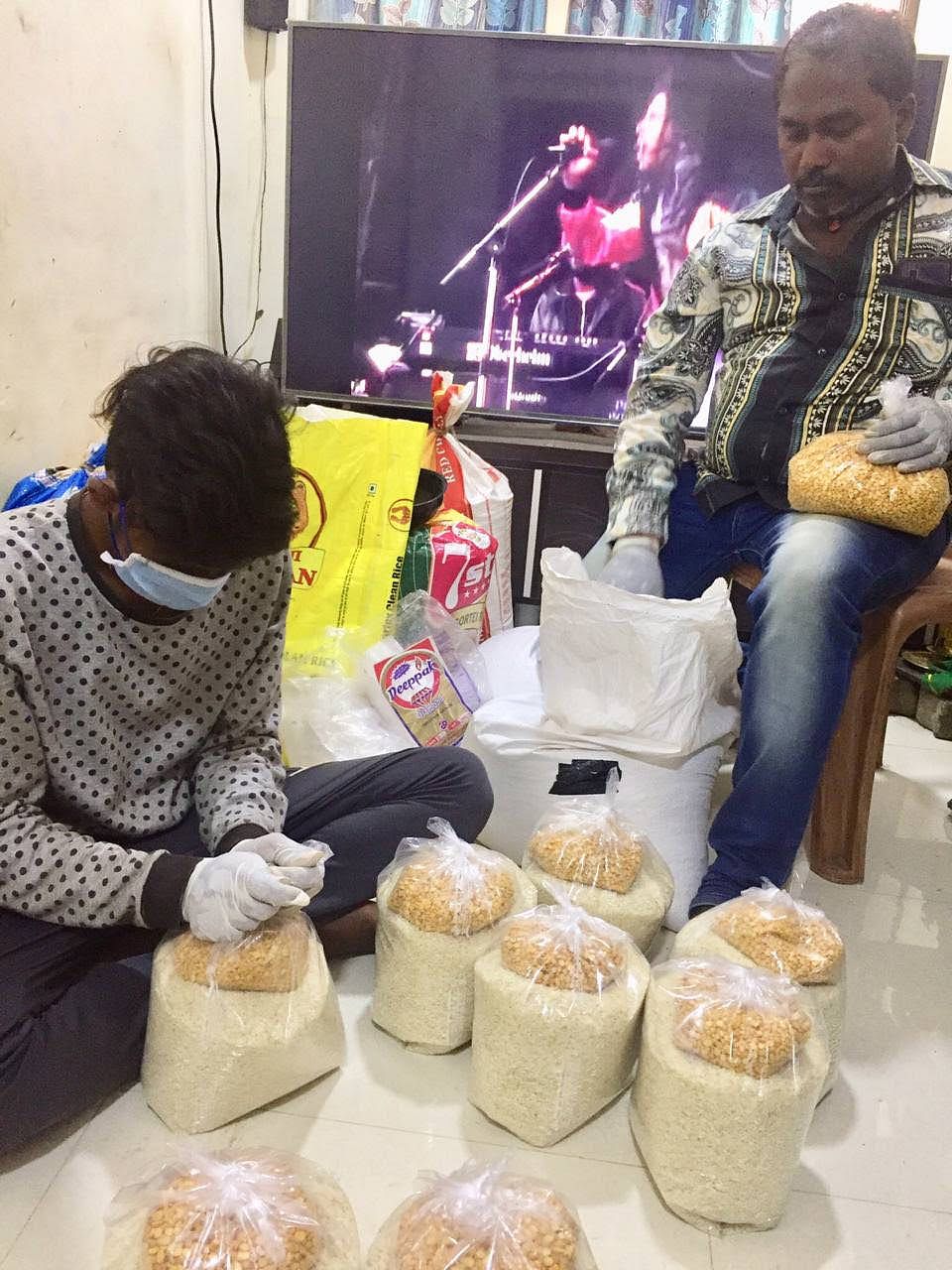 Our volunteers preparing ration kits