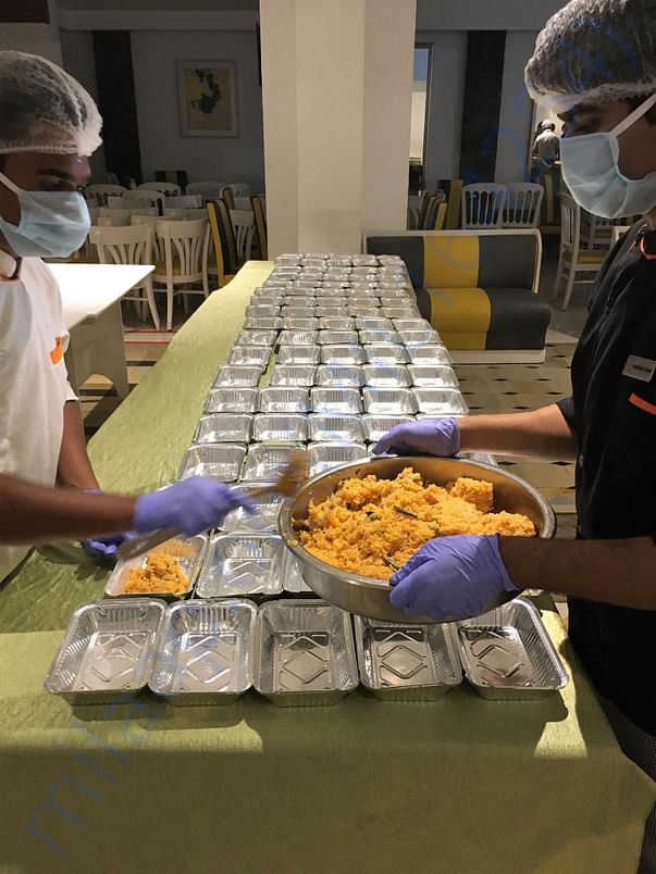 Dinner being packed in one of our kitchens