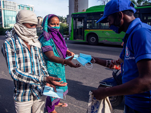 Covid-19: Free sanitizer and mask to daily labors and school children