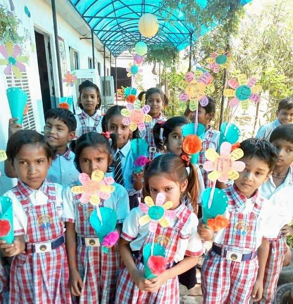 Sponsor a child education for a year.