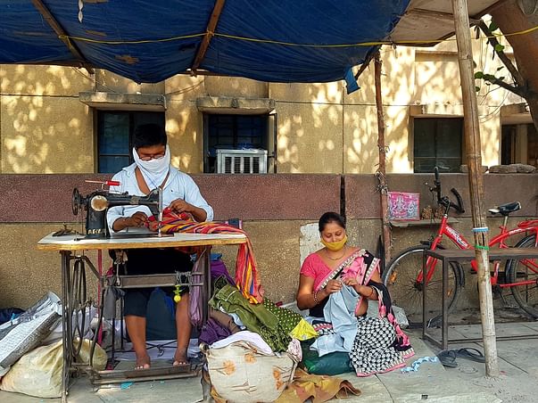 Help this roadside tailor educate his daughters