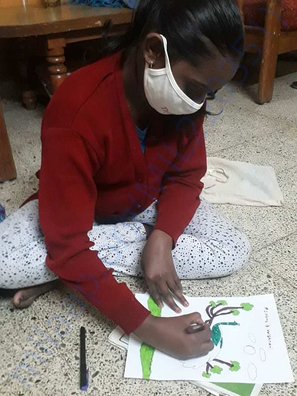 Vaishnavi doing her art work :)