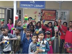 Support NEET's free community library for under privileged children