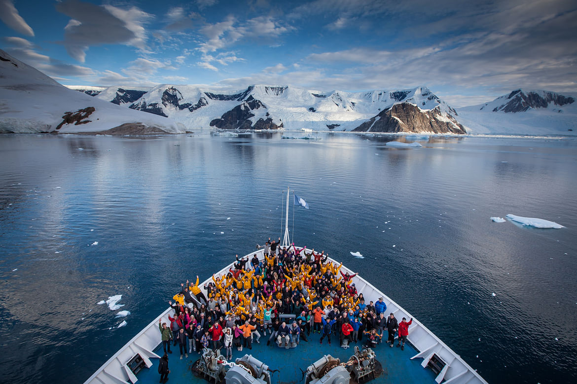 Group picture onboard an earlier expedition. I hope to a part of this photograph next year