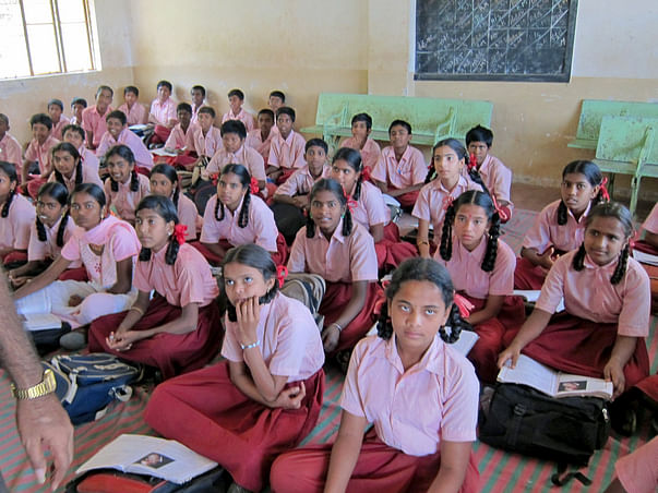 I am fundraising to to buy wood benches for a government school