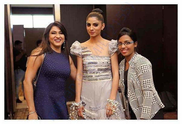 Our student featuring her design at the IDC, with Ms. Beena Kannan