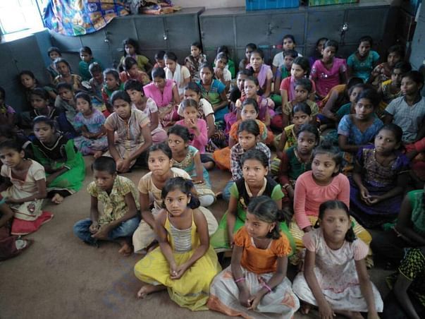 Kids excited to receive their slippers