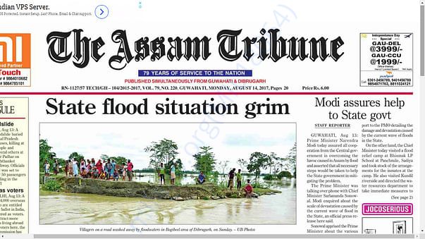 write a newspaper report on flood in assam